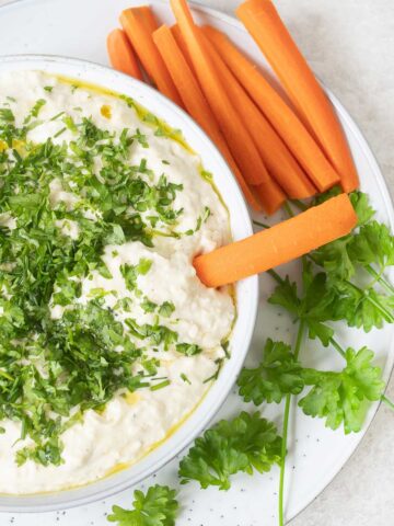 Butter bean hummus and a carrot stick.