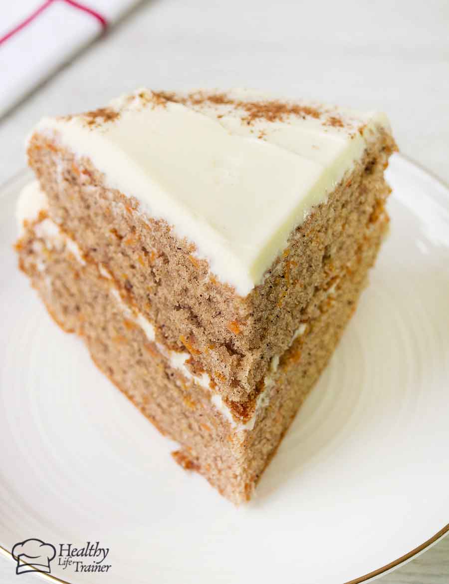 Easy carrot cake slice topped with cream cheese frosting.