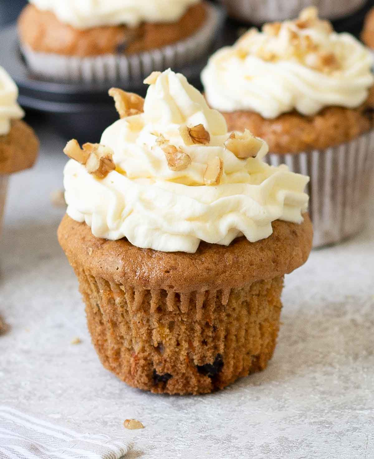 One carrot cake cupcake without the muffin liner.