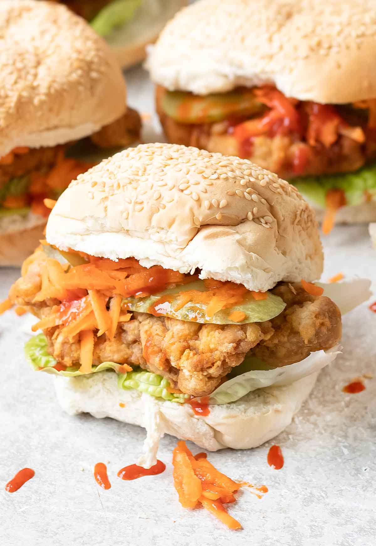 Close shot to fried chicken burger sandwich.