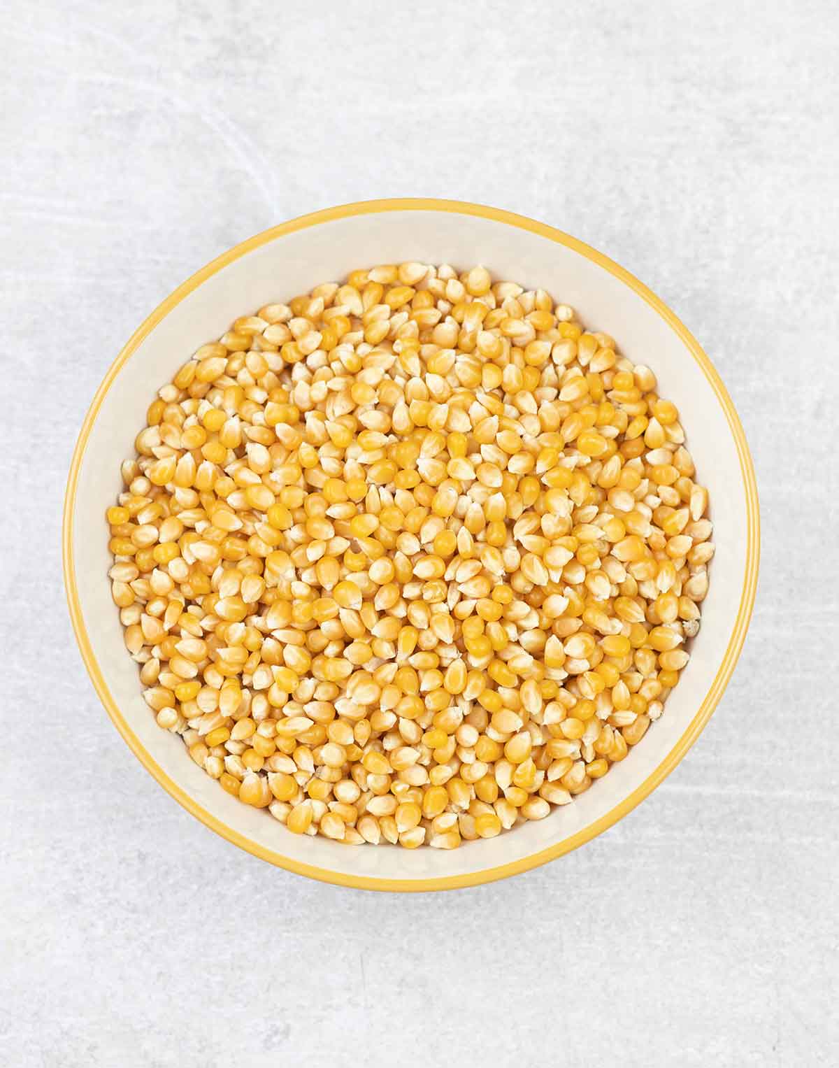 Dried corn kernels in a bowl.