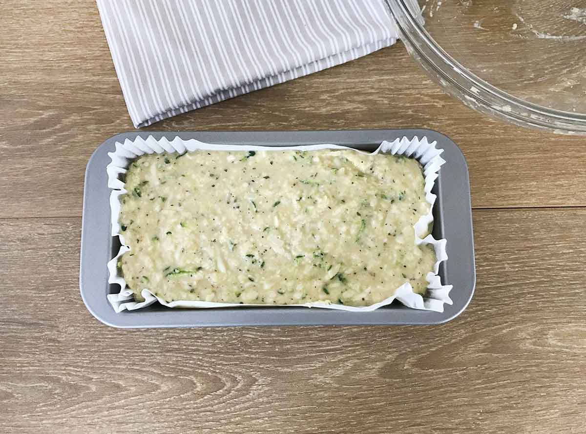 Scoop the batter into the loaf pan.