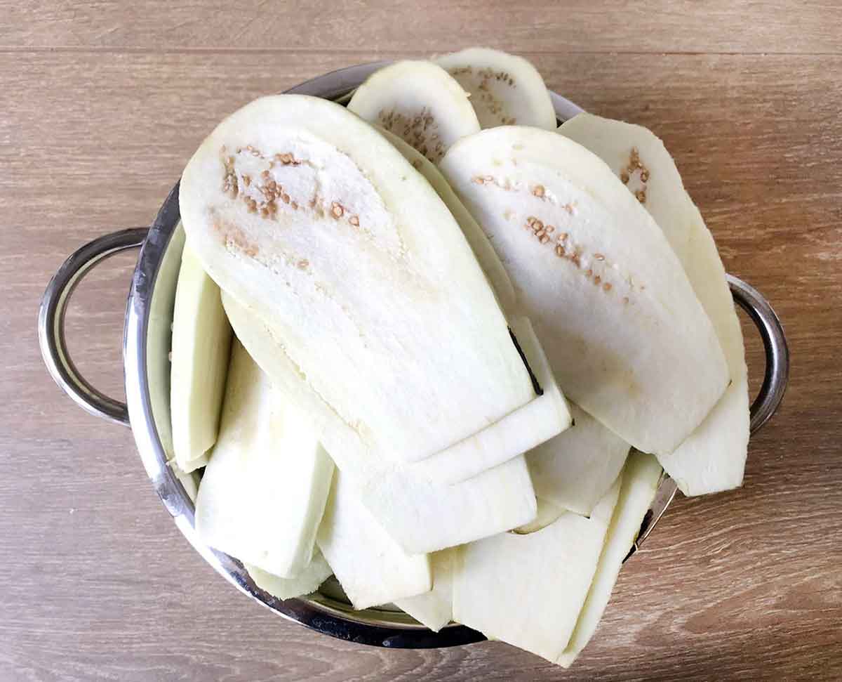 Slice the eggplants thinly and season with salt.