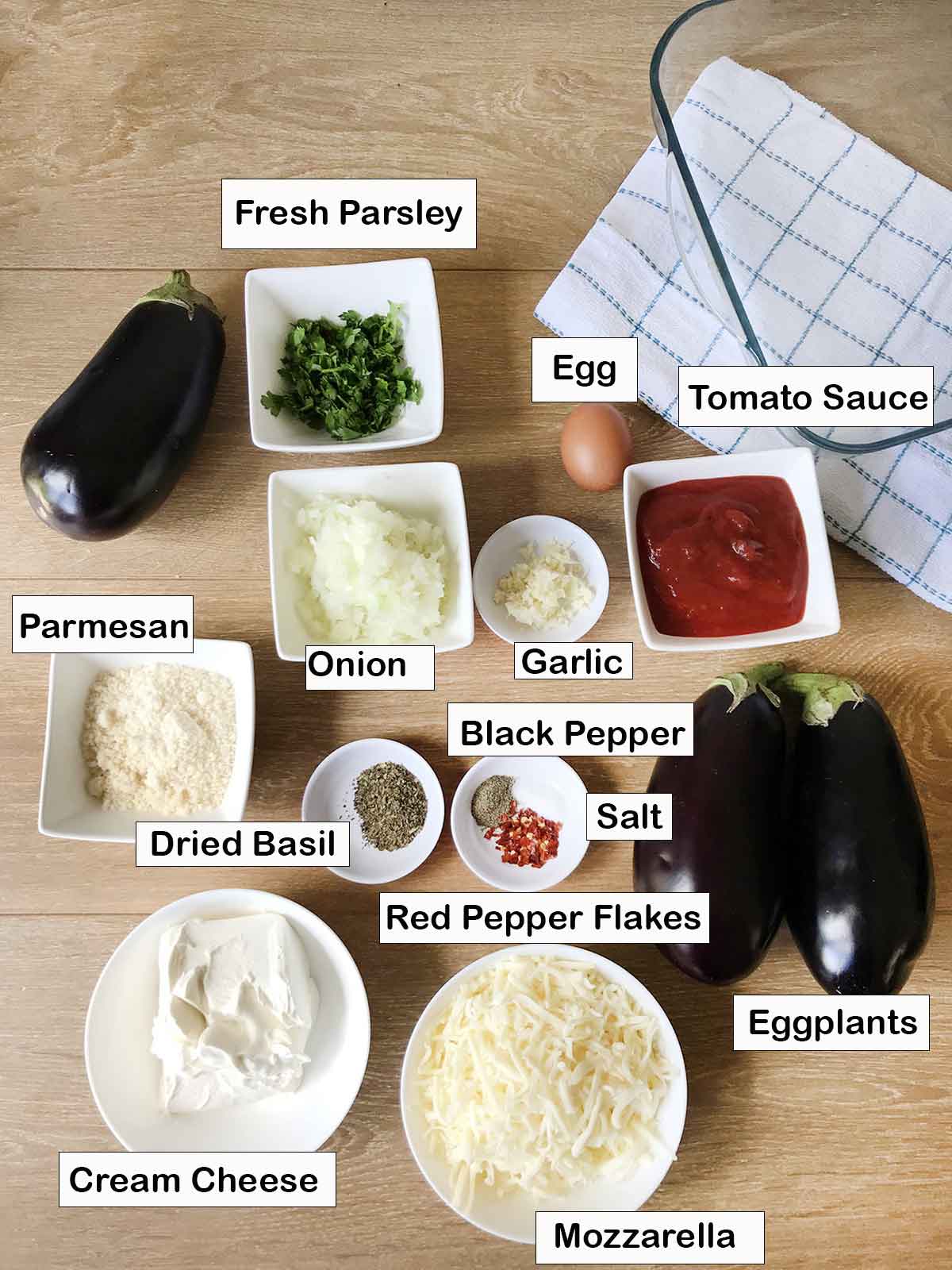 labeled ingredients on table for making no-noodle keto eggplant lasagna.