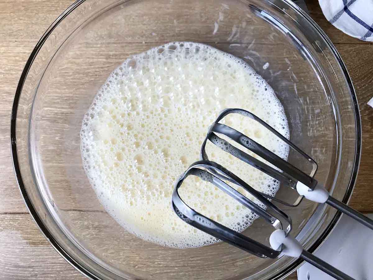 Whisk all wet ingredients (eggs, olive oil, coconut milk and half of the water).