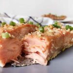 Baked honey glazed salmon on a plate.