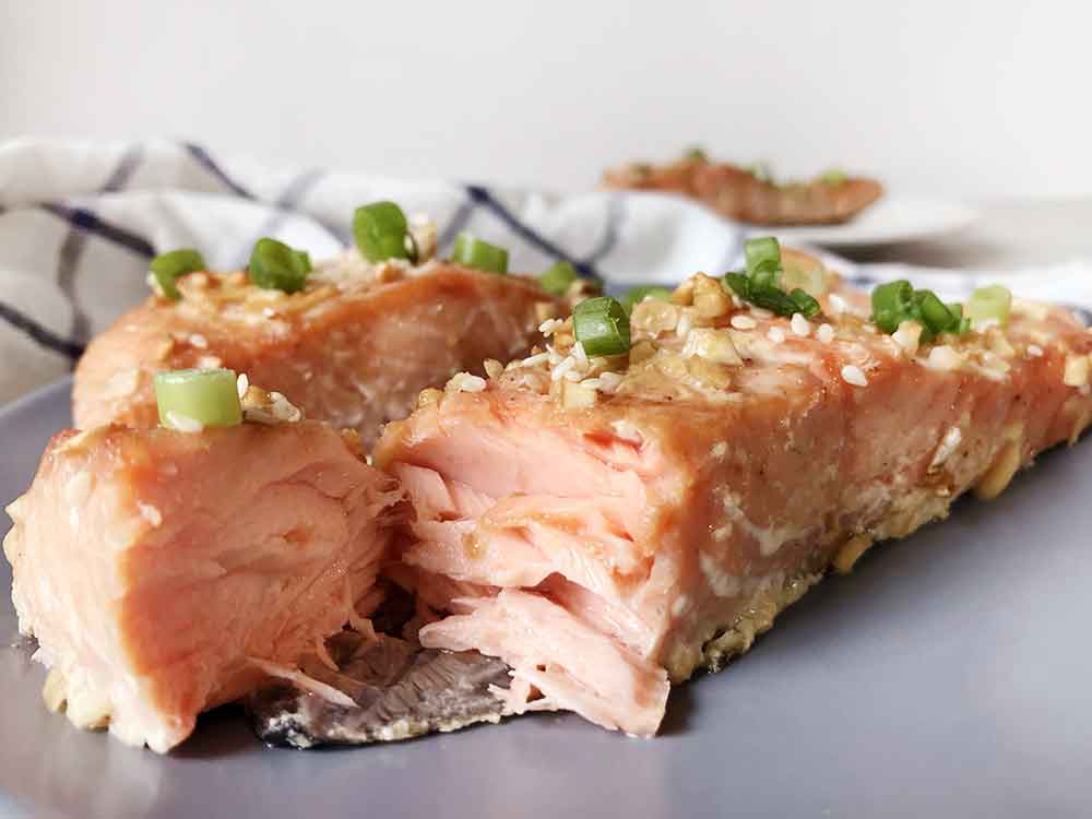 Baked honey glazed salmon on a plate.