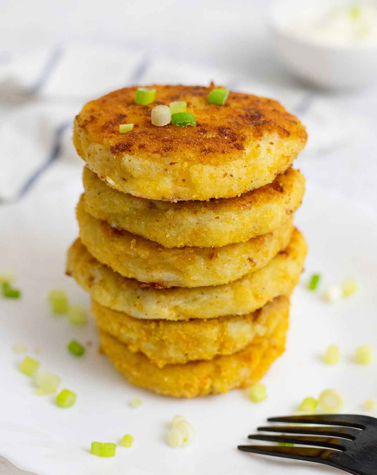 Leftover mashed potato pancakes on top of each other.