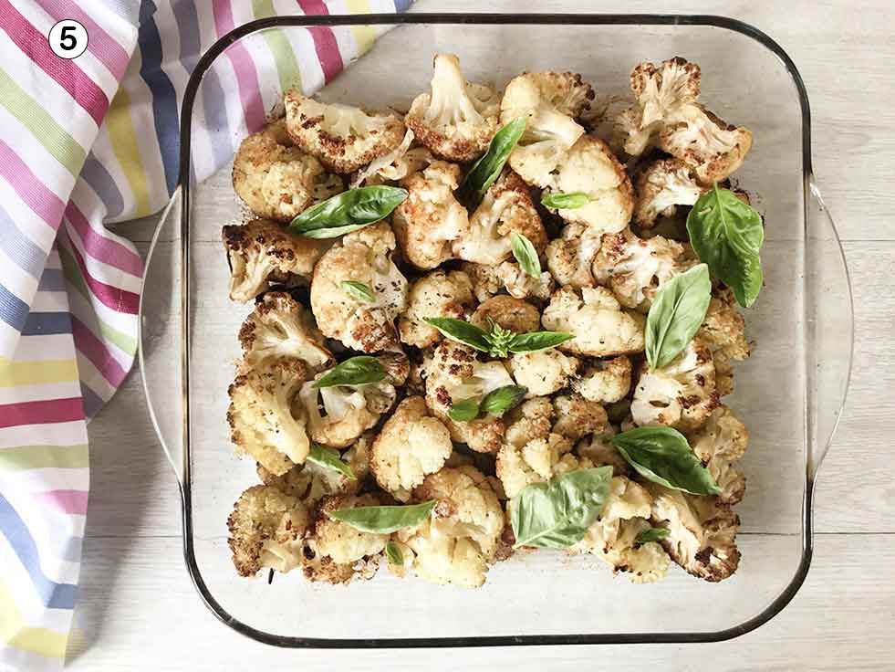 Place cauliflower florets in a single layer in the baking tray and bake.