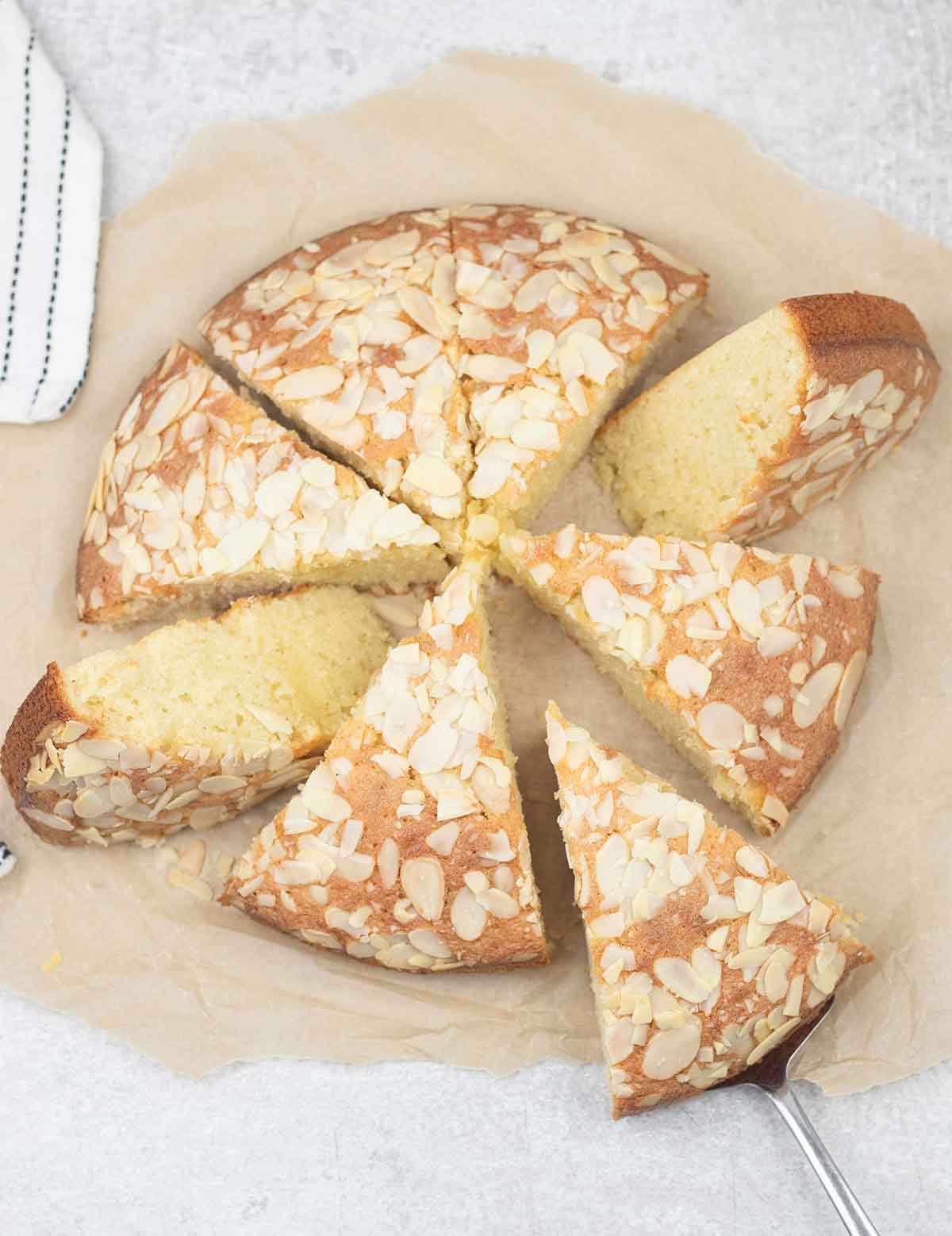 Italian almond cake topped with almond flakes.