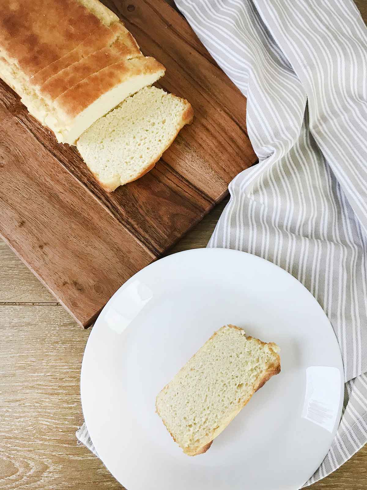 Cut a slice of keto cream cheese bread.
