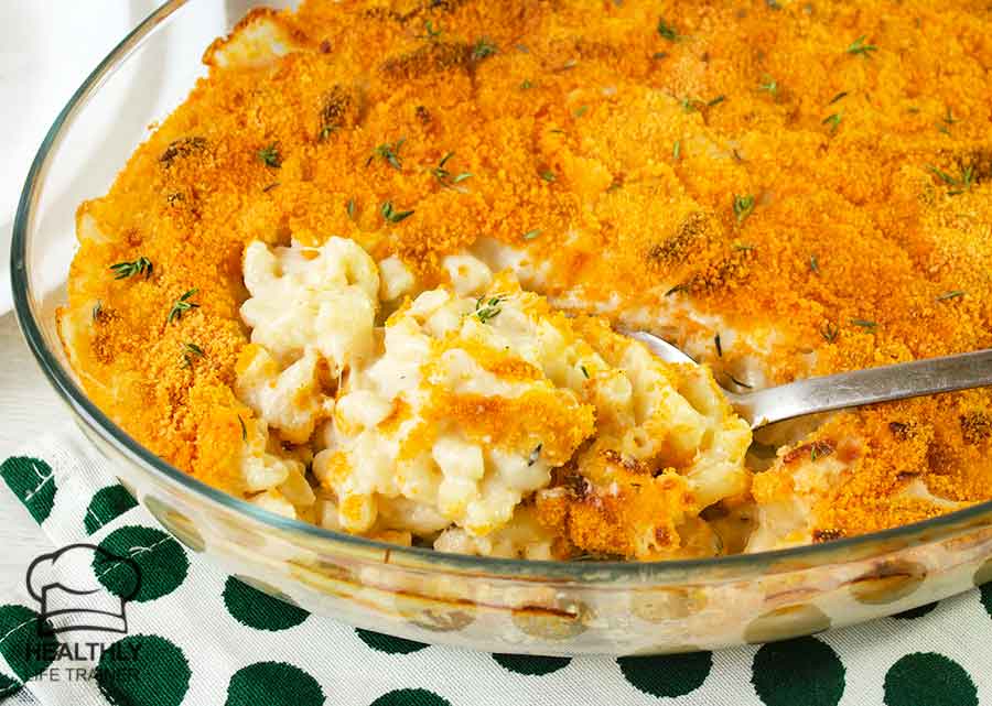 Old fashioned baked macaroni and cheese in a casserole dish.