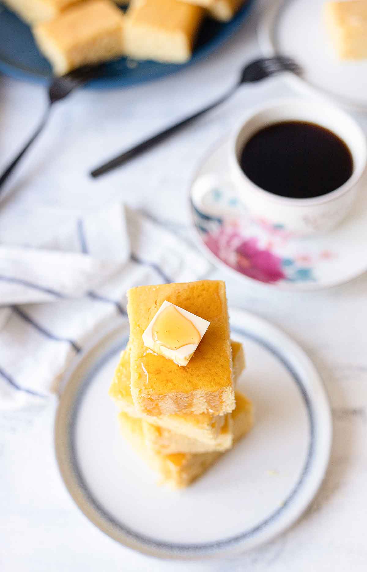 Overhead shot to slices of cornbread cake in a plate.