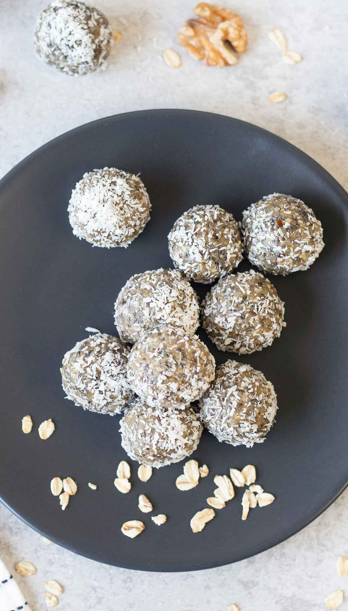 Overheat shot to the date energy bites in a serving plate.