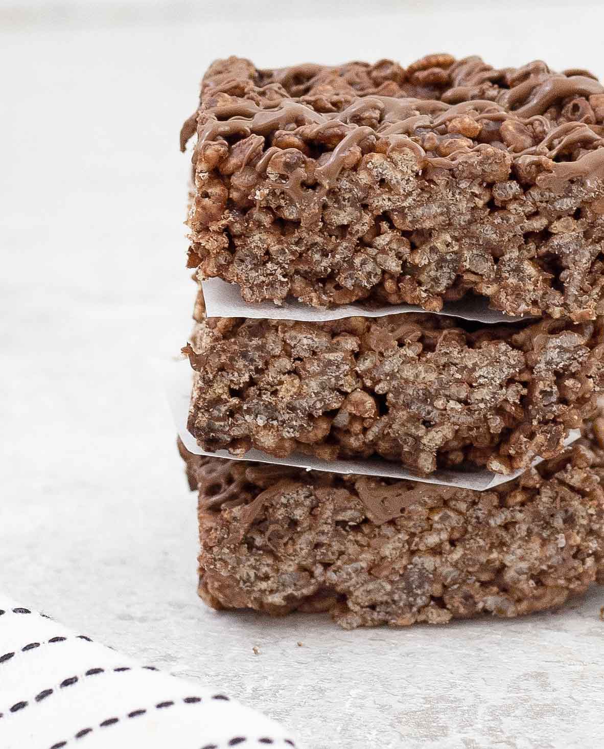 Chocolate rice krispie bars on top of each others.