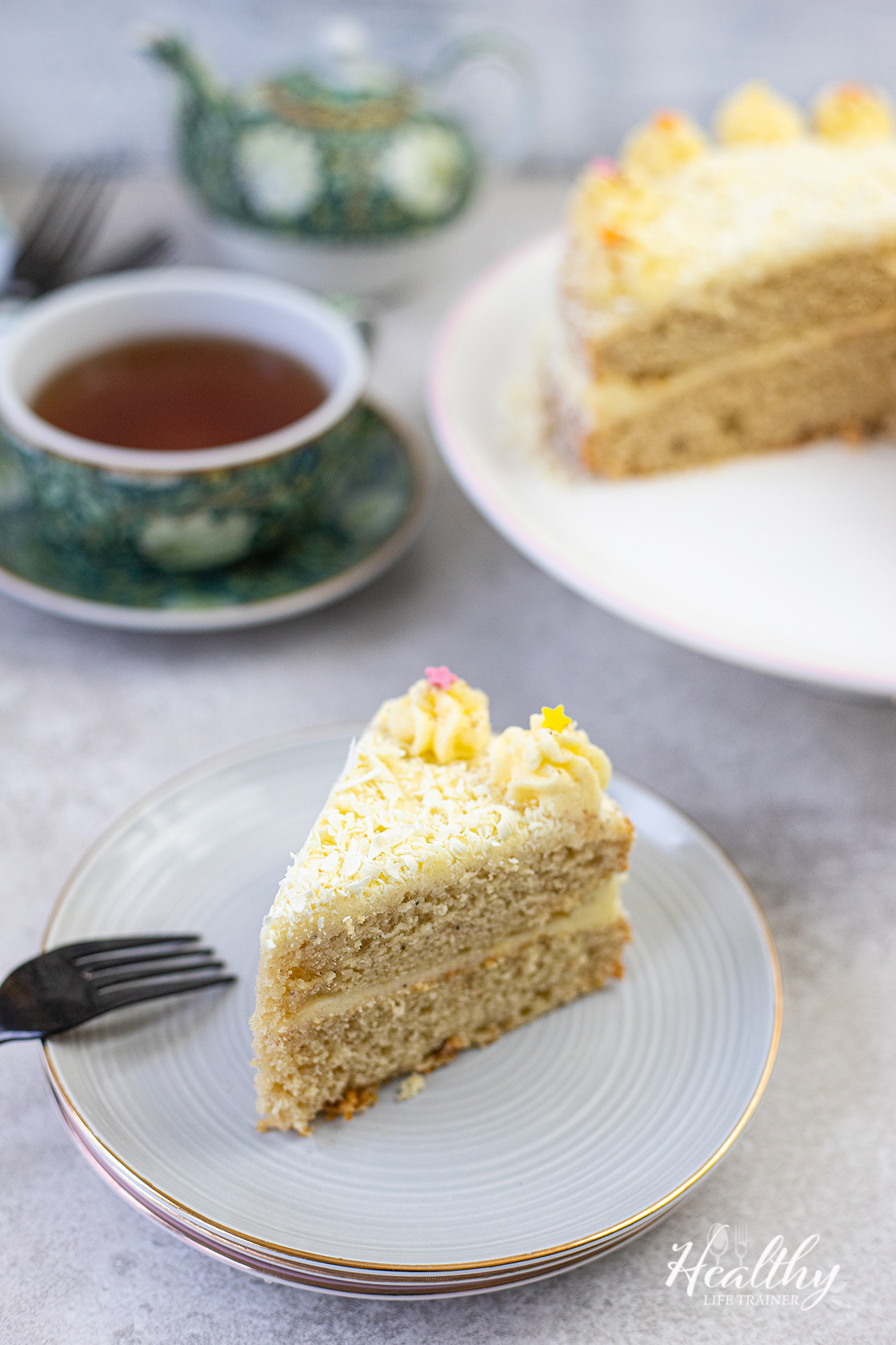 a slice of the eggnog cake is on a serving plate.