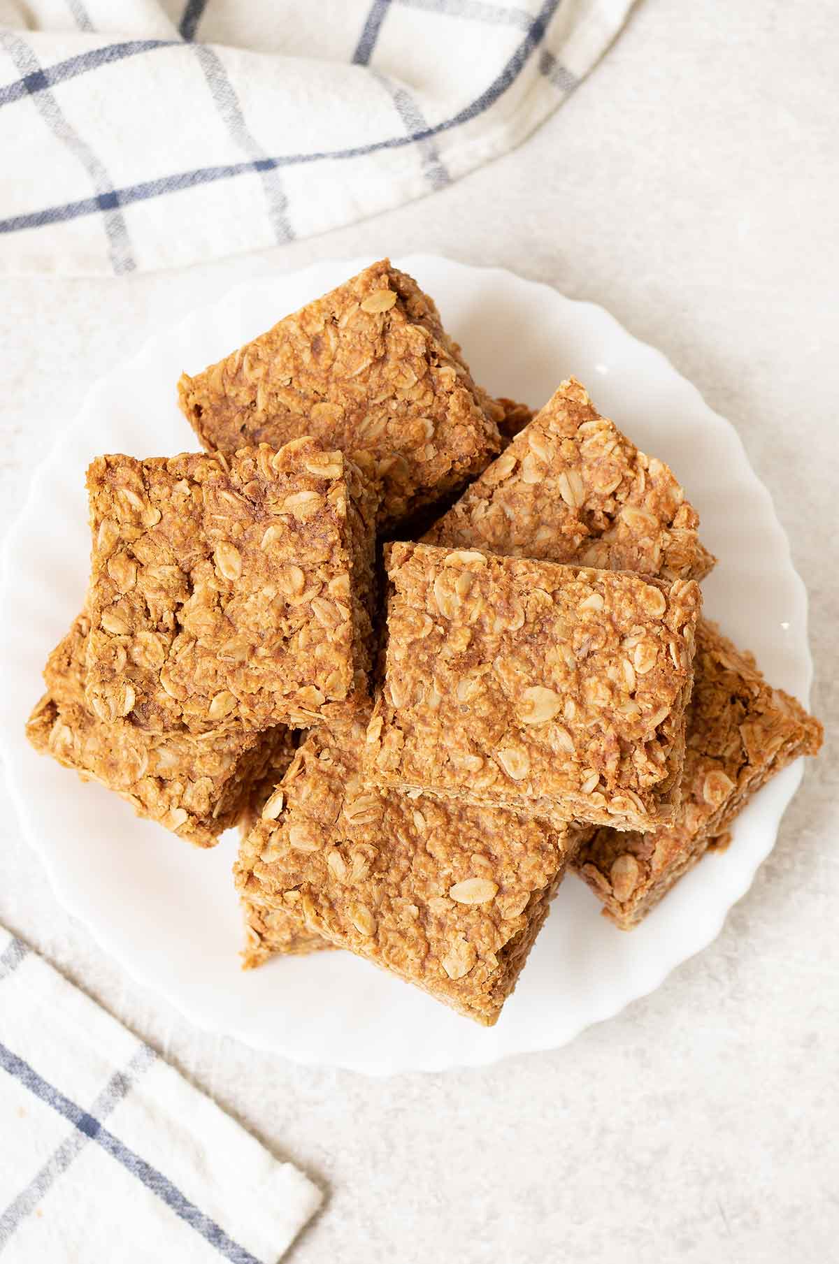 overheat shot to peanut butter flapjacks squares in a plate.