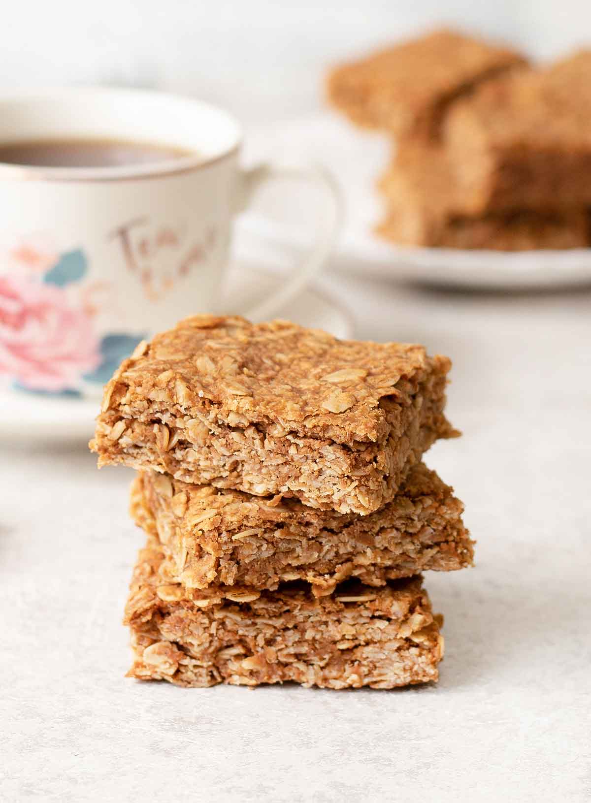 3 peanut butter flapjacks squares on top of each others.