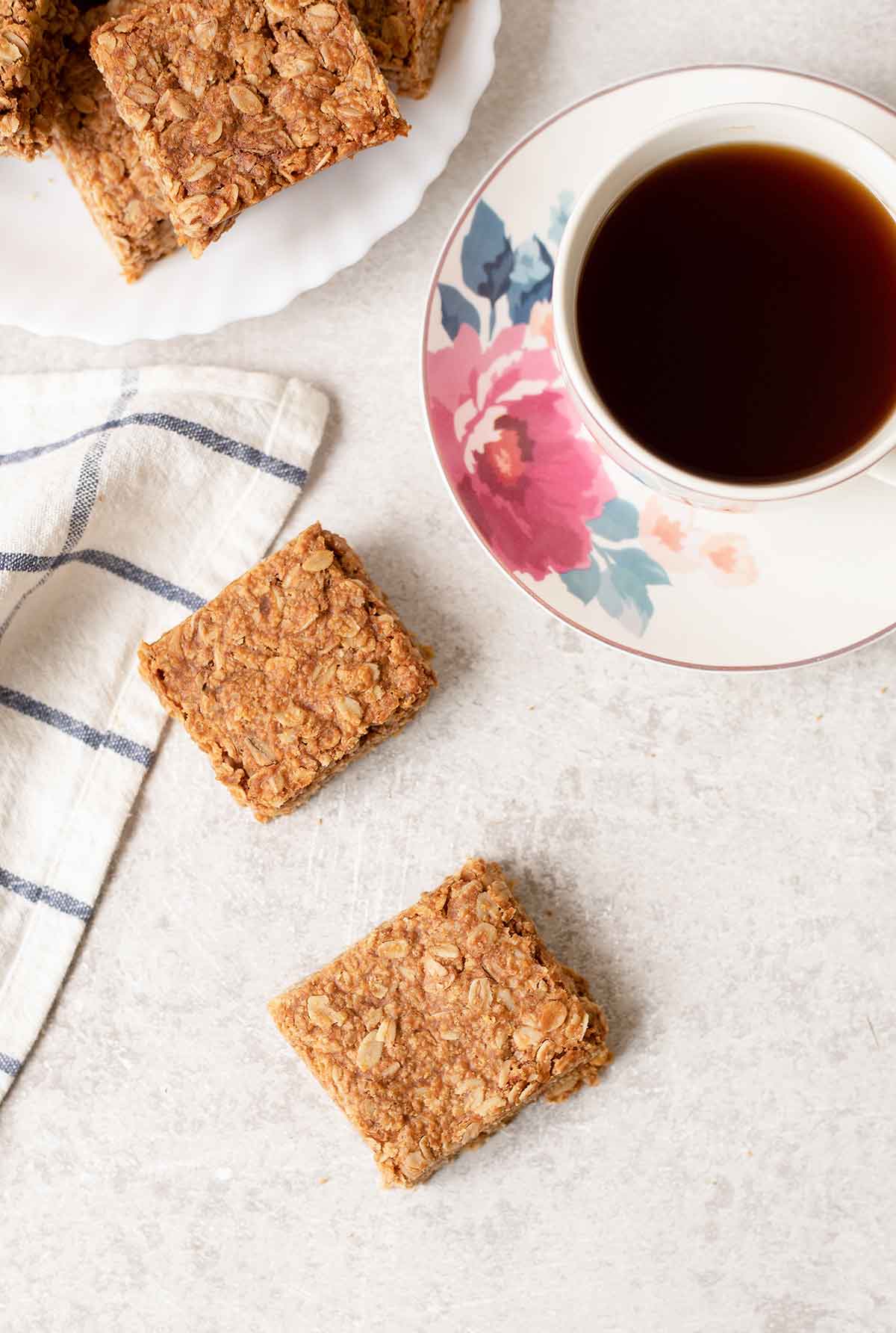 2 squares of peanut butter flapjacks and a cup of tea.