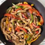 Black Pepper Beef Stir Fry with bell pepper and onion slices.