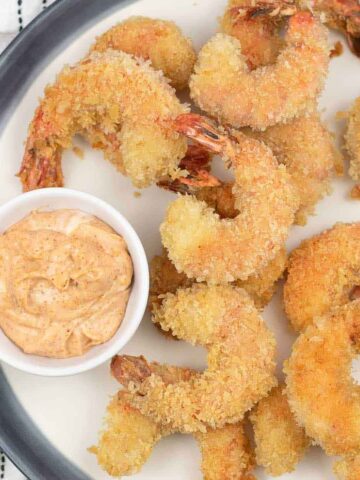 Cajun Fried Shrimp and a small bowl of Cajun dipping sauce.