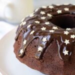 Chocolate Sour Cream Bundt Cake topped with chocolate ganache.