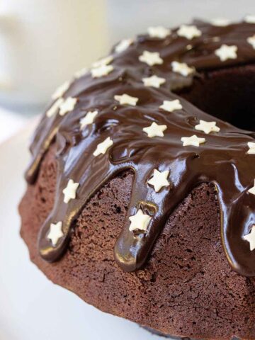 Chocolate Sour Cream Bundt Cake topped with chocolate ganache.