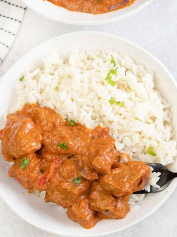 Lamb Tikka Masala on top of white rice.