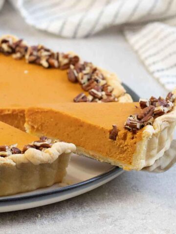 Cut a slice of the Pumpkin Custard Pie.