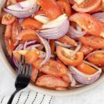 Tomato Onion Salad in a bowl.