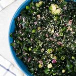 Japanese Seaweed Salad (Wakame) topped with green onion and sesame seeds.