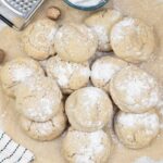 nutmeg cookies topped with powdered sugar.