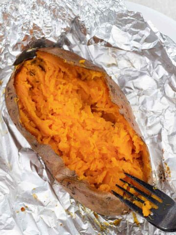 Baked Sweet Potatoes in a foil sheet.