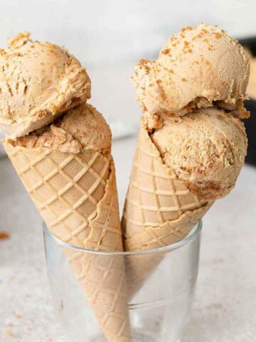 biscoff ice cream in 2 biscuit cones.