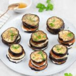 Eggplant Napoleons on a serving plate.