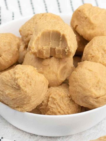 Peanut butter balls in a bowl.