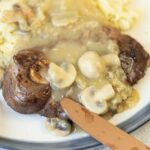 Steaks with mushroom gravy.